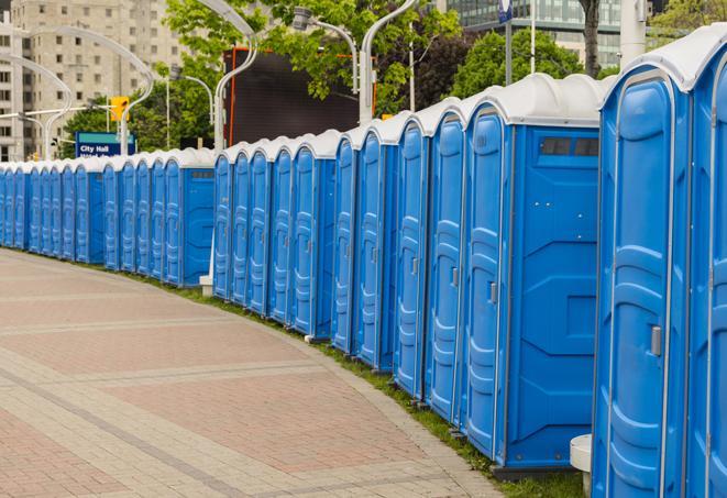 a row of portable restrooms ready for eventgoers in Beaverton